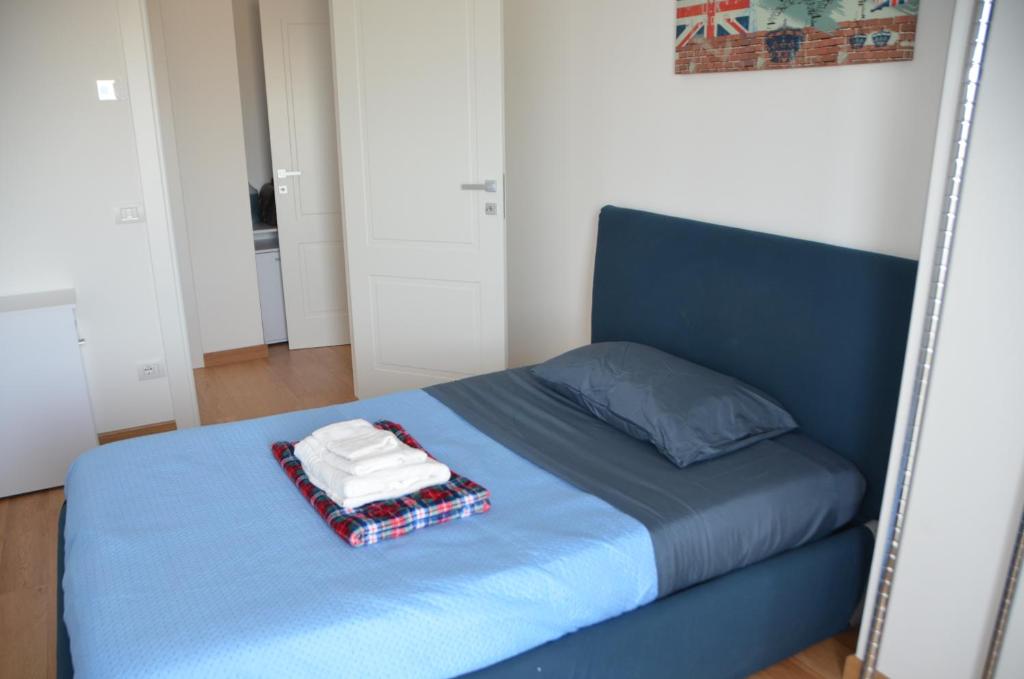 Postel nebo postele na pokoji v ubytování Suite 39 tra Roma e il mare