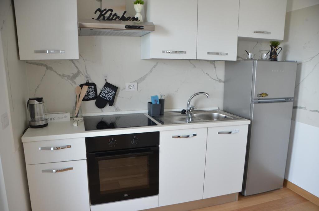 Kuchyň nebo kuchyňský kout v ubytování Suite 39 tra Roma e il mare