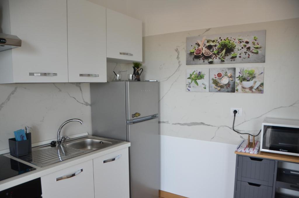 Kuchyň nebo kuchyňský kout v ubytování Suite 39 tra Roma e il mare
