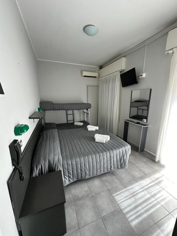 Postel nebo postele na pokoji v ubytování Hotel Austria
