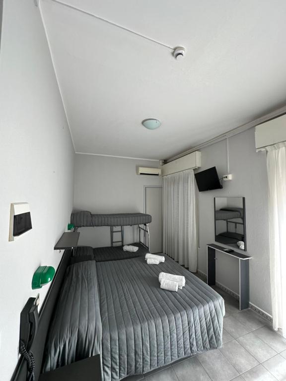 Postel nebo postele na pokoji v ubytování Hotel Austria