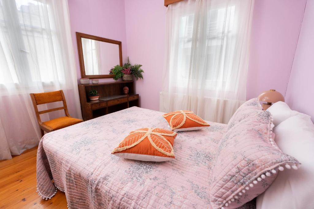 Postel nebo postele na pokoji v ubytování Aggire Zante Retro Residence