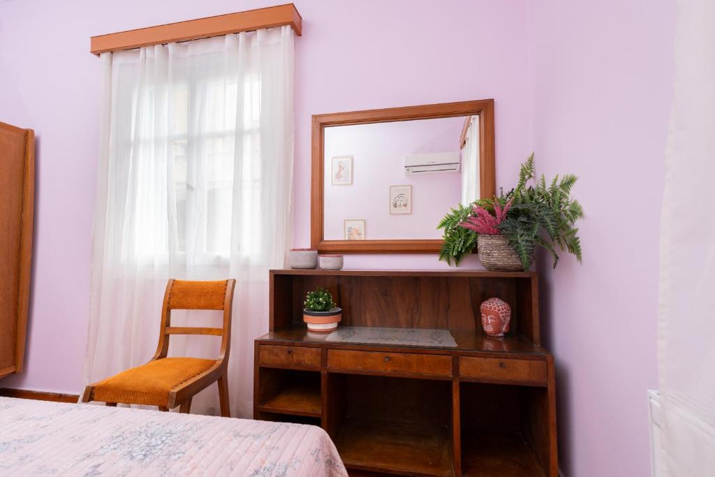 Postel nebo postele na pokoji v ubytování Aggire Zante Retro Residence
