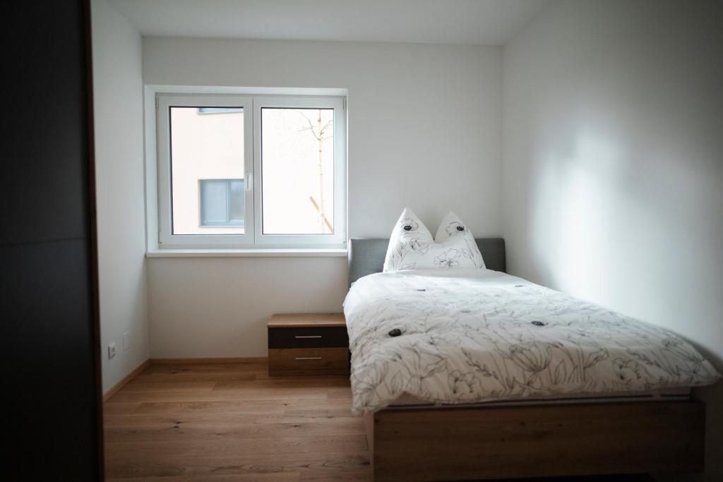 Postel nebo postele na pokoji v ubytování Premium Apartments Monterra