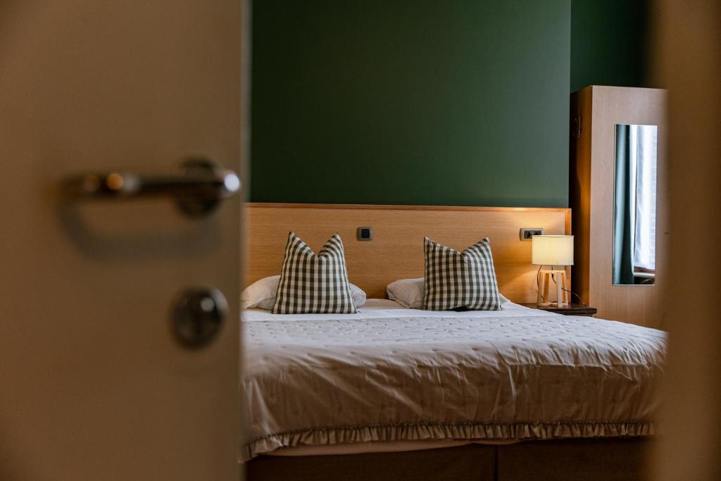 Postel nebo postele na pokoji v ubytování Boutique Hotel Malleberg