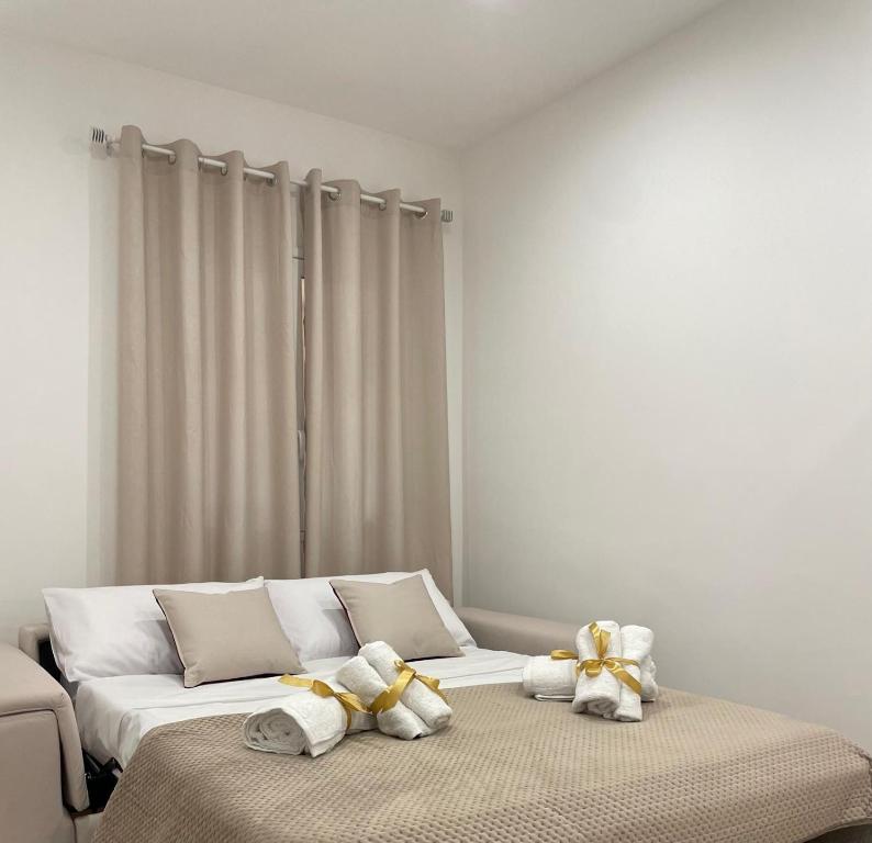 Cama o camas de una habitación en Maquè apartments