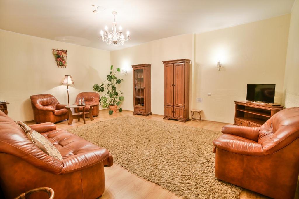 TV a/nebo společenská místnost v ubytování Dinaburg SPA Hotel