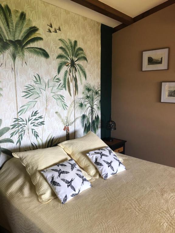 Postel nebo postele na pokoji v ubytování La Plantation