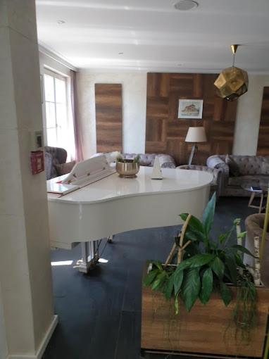 Postel nebo postele na pokoji v ubytování SEE-Hotel Seeschau - direkt am Bodenseeufer