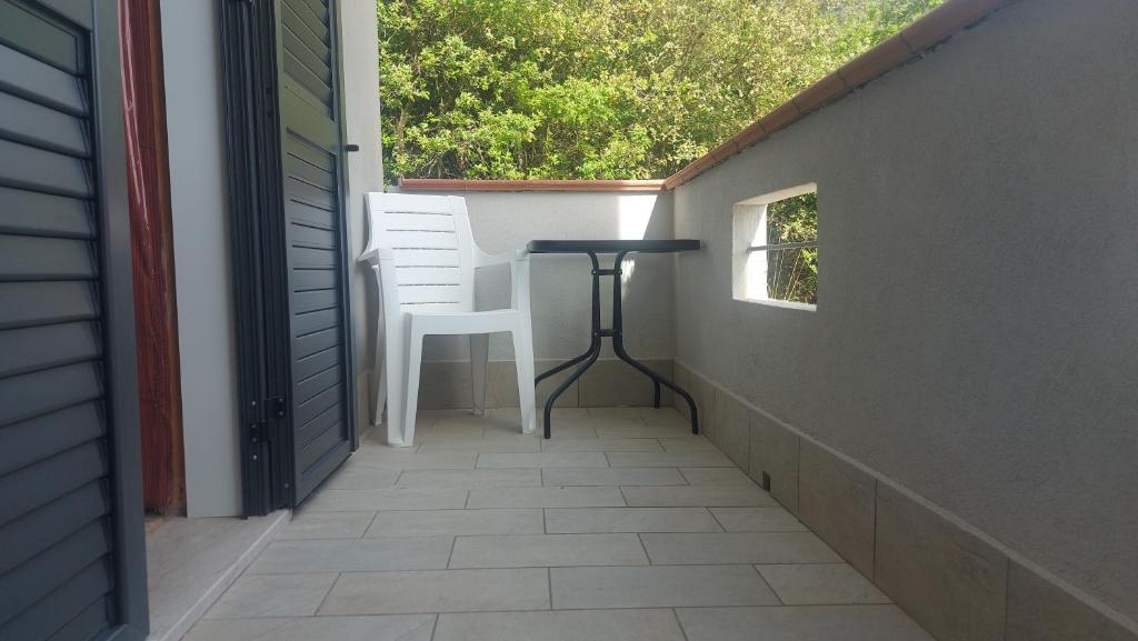 Balkón alebo terasa v ubytovaní b&b binario nove e tre quarti