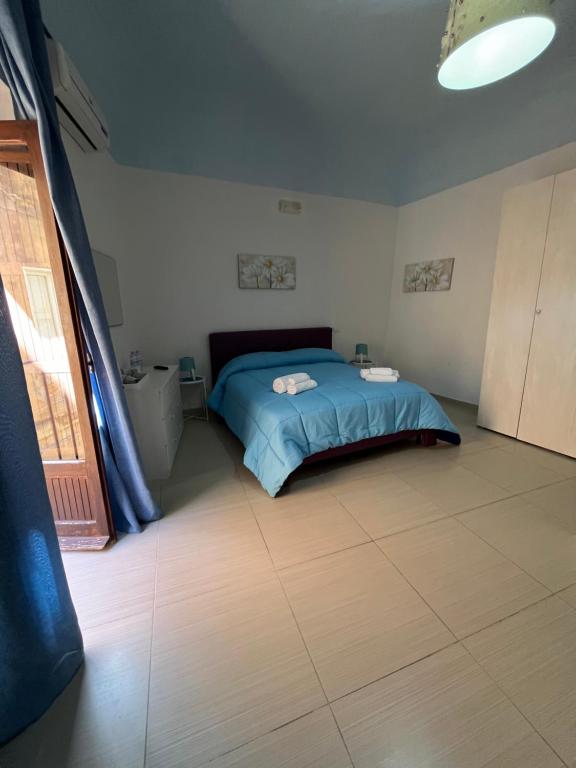Postel nebo postele na pokoji v ubytování PERSEFONE LUXURY SUITE