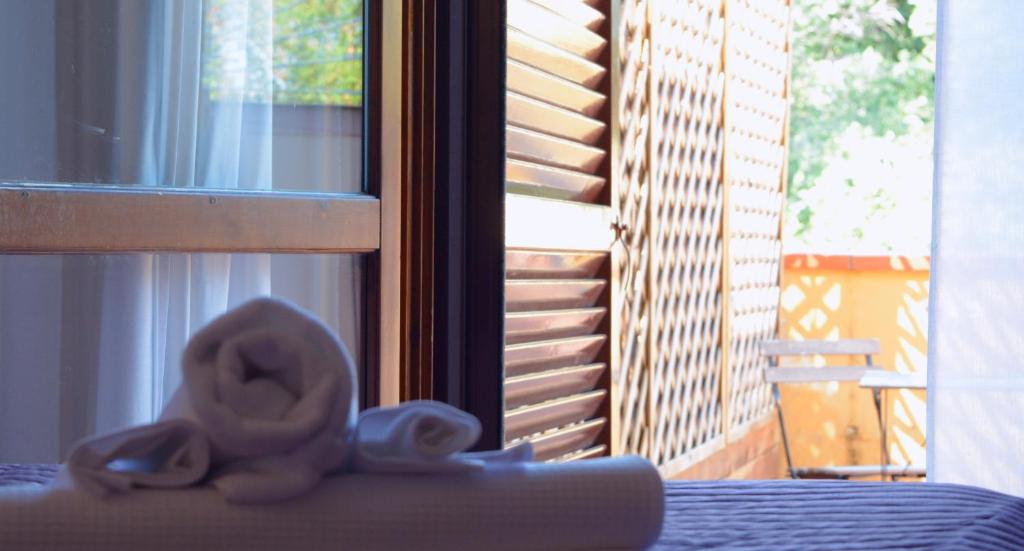 Postel nebo postele na pokoji v ubytování Hotel Francesco
