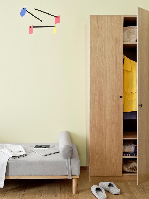 Postel nebo postele na pokoji v ubytování BRIK Apartment Hotel
