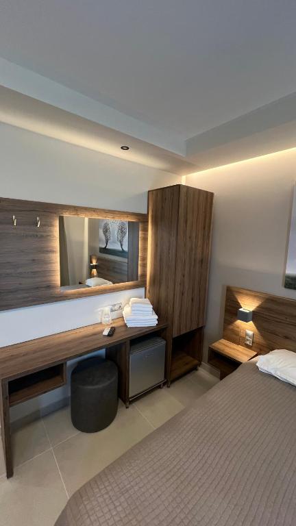 Postel nebo postele na pokoji v ubytování Sunset Hotel