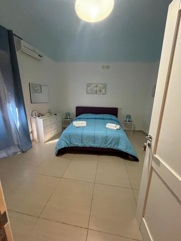 Postel nebo postele na pokoji v ubytování PERSEFONE LUXURY SUITE
