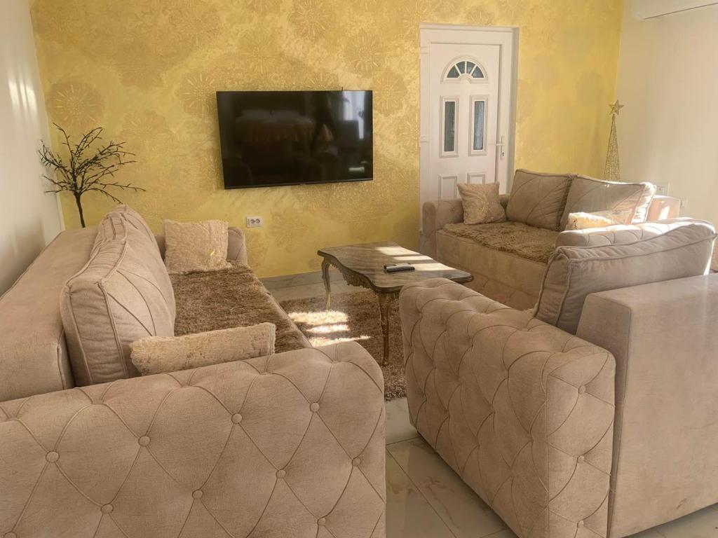 Posezení v ubytování DINA LUX Apartman
