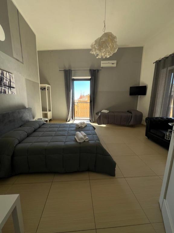Postel nebo postele na pokoji v ubytování PERSEFONE LUXURY SUITE