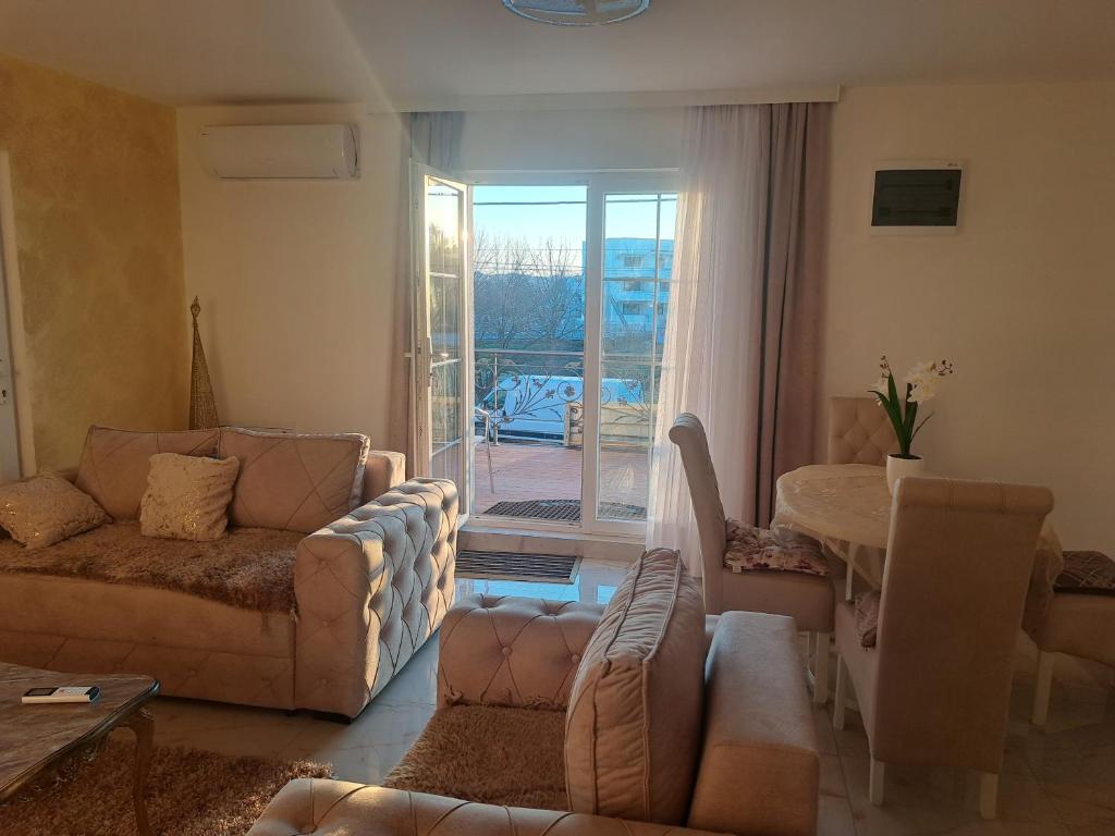 Posezení v ubytování DINA LUX Apartman
