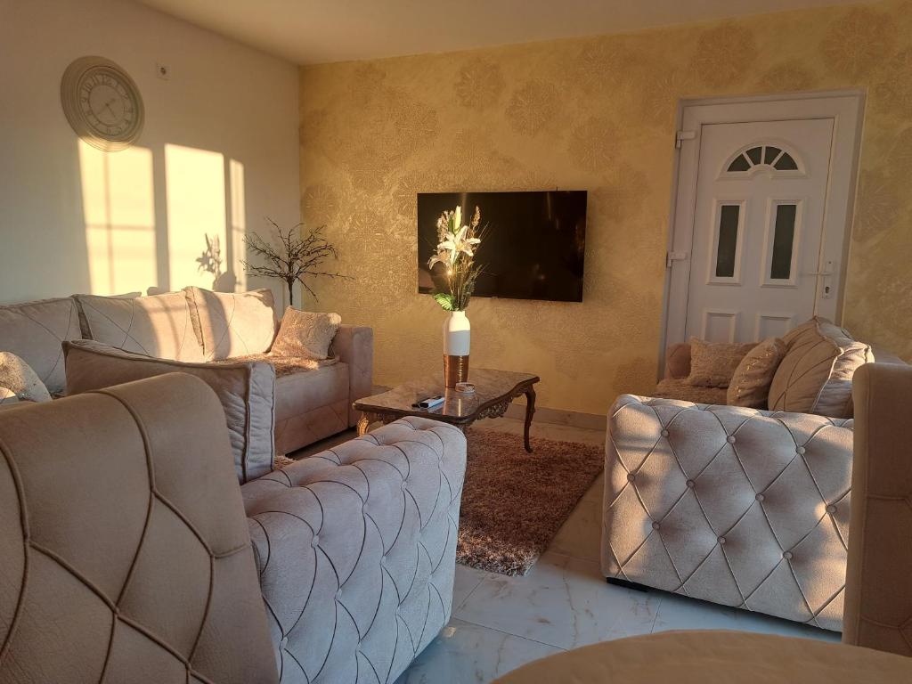 Posezení v ubytování DINA LUX Apartman