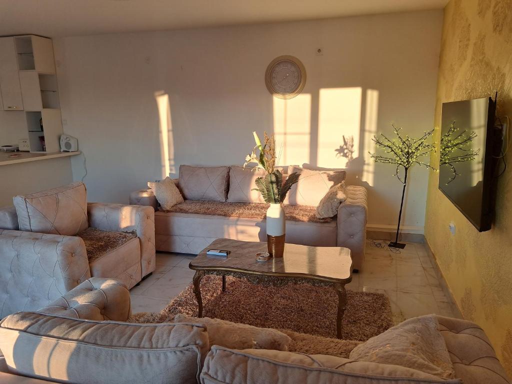 Posezení v ubytování DINA LUX Apartman