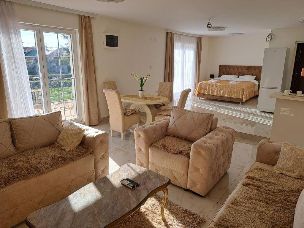 Posezení v ubytování DINA LUX Apartman