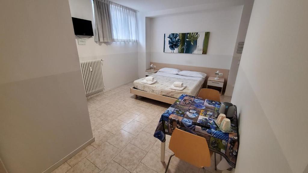 Postel nebo postele na pokoji v ubytování HB Bonomelli 15