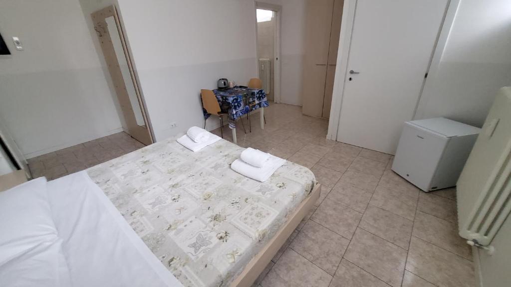Postel nebo postele na pokoji v ubytování HB Bonomelli 15