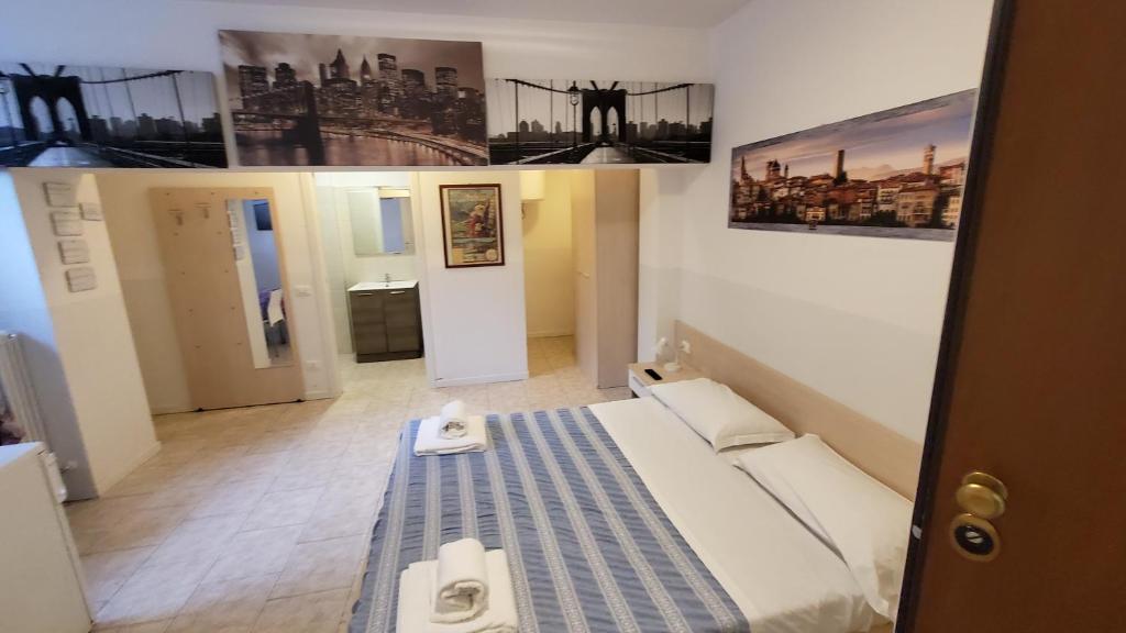 Postel nebo postele na pokoji v ubytování HB Bonomelli 15