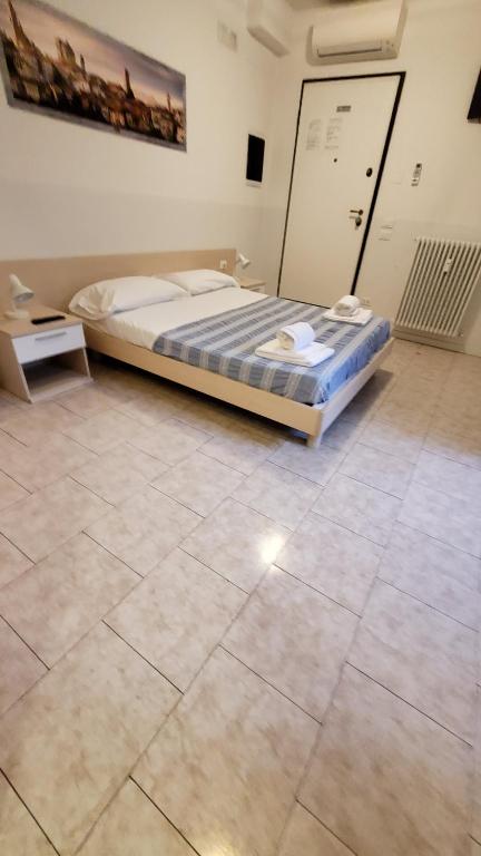 Postel nebo postele na pokoji v ubytování HB Bonomelli 15