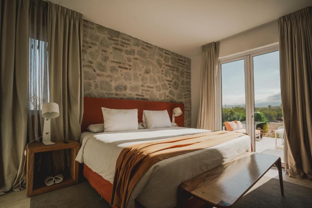 Postel nebo postele na pokoji v ubytování Chozos Resort