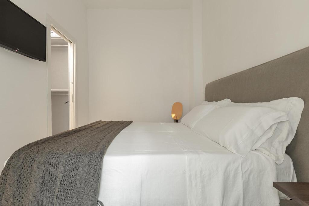 Posteľ alebo postele v izbe v ubytovaní Bastioni Luxury Home by Perle di Puglia