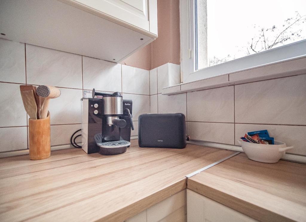 Kuchyňa alebo kuchynka v ubytovaní Apartament Dworska