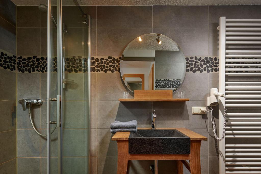 Koupelna v ubytování Hotel Ladenmühle
