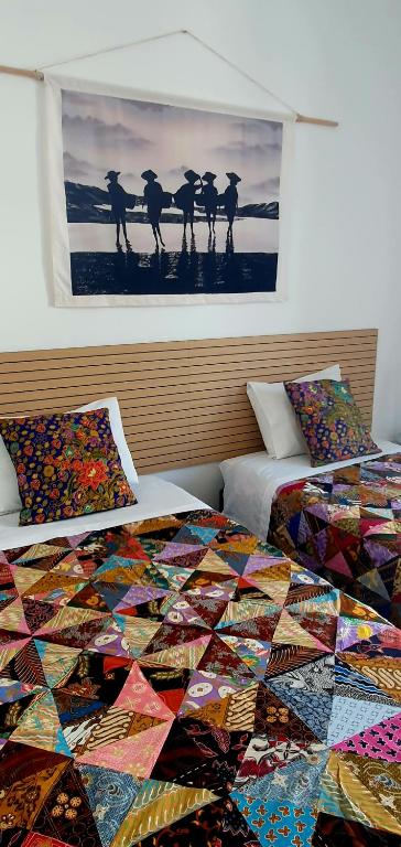 Postel nebo postele na pokoji v ubytování A-Típica GuestHouse
