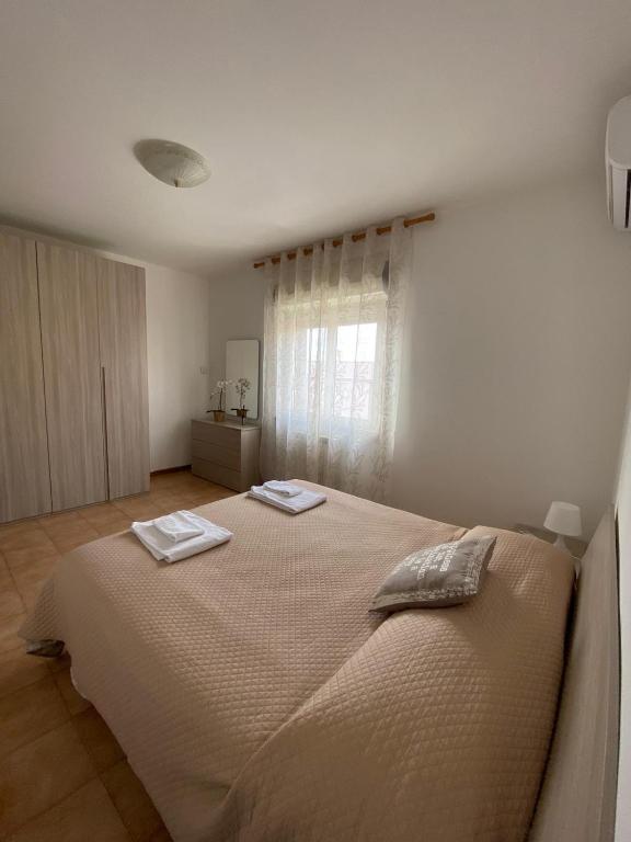 Postel nebo postele na pokoji v ubytování IL TULIPANO
