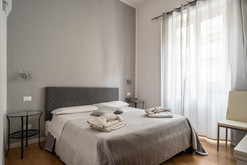 A bed or beds in a room at B&b Glamour