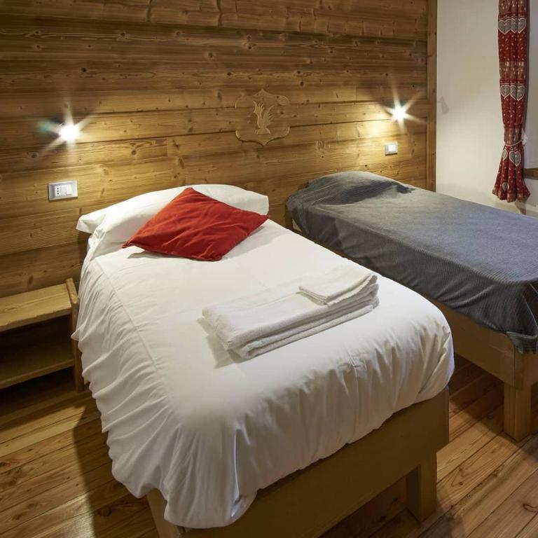 Postel nebo postele na pokoji v ubytování Chalet du Paradis