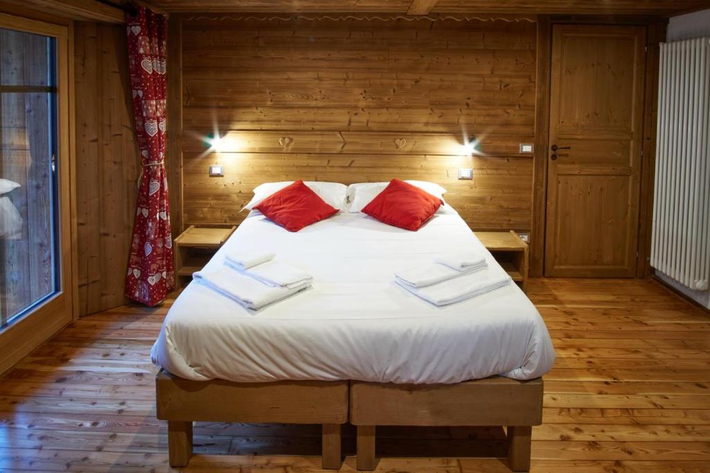 Postel nebo postele na pokoji v ubytování Chalet du Paradis