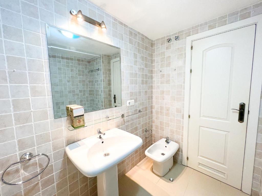 Kúpeľňa v ubytovaní La Reserva Beach & Golf Apartment