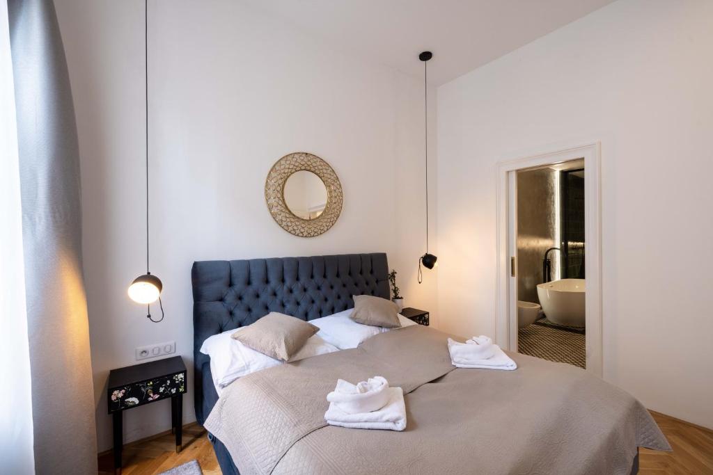 Postel nebo postele na pokoji v ubytování Apartmány Marienhof