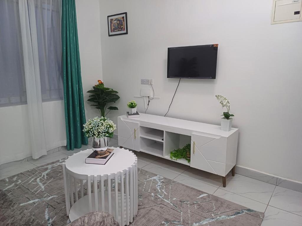 TV a/nebo společenská místnost v ubytování Havy Homes