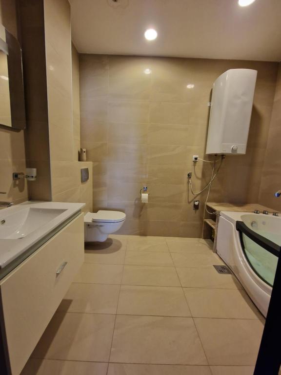 Koupelna v ubytování SkyAprt77m Jacuzzi