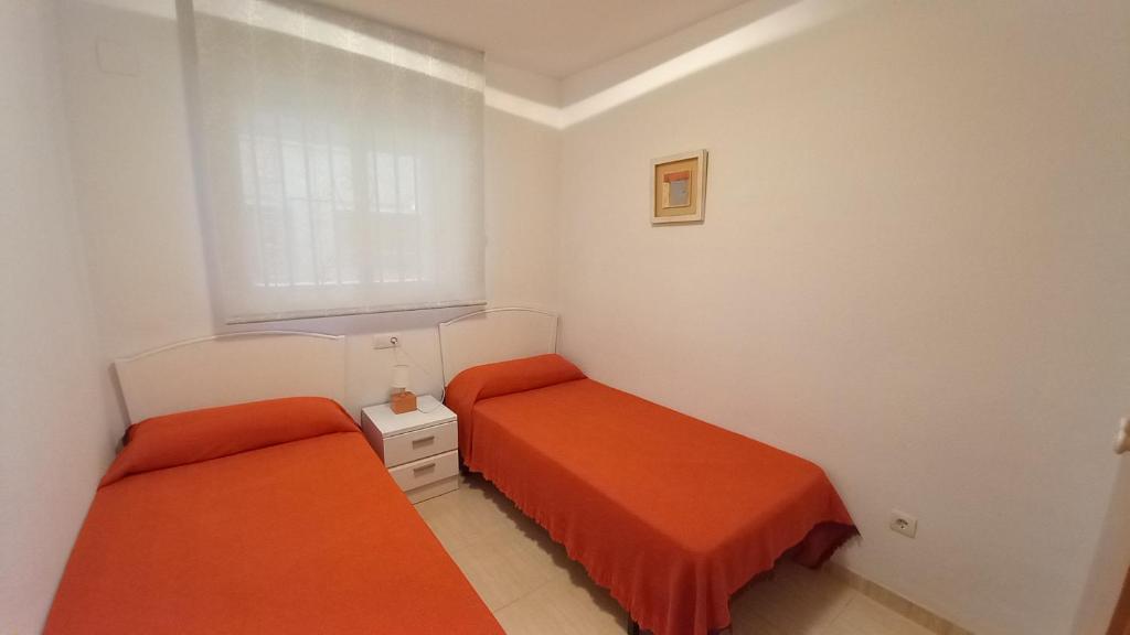 Postel nebo postele na pokoji v ubytování Apartamento la Brisa del Mar