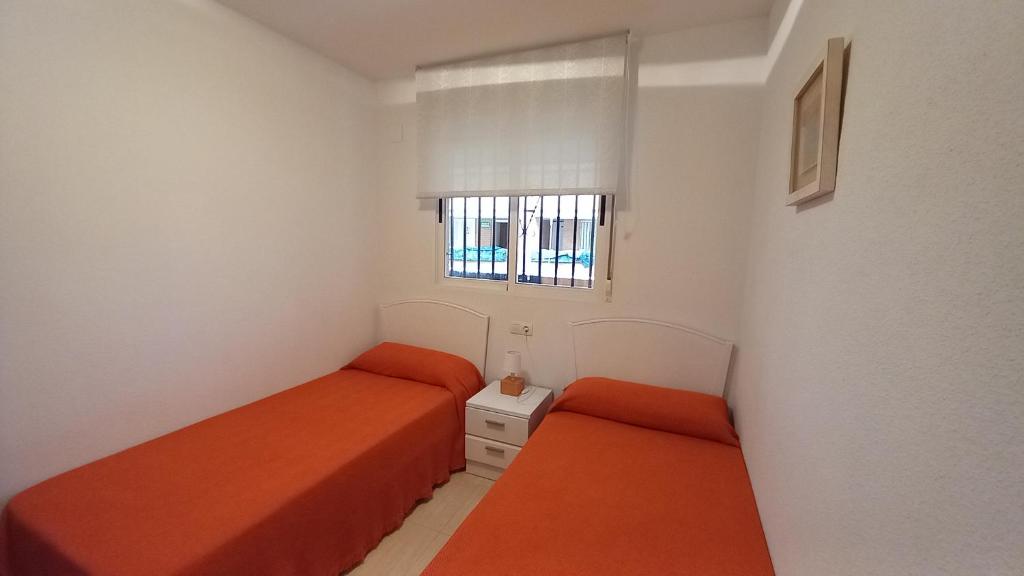 Postel nebo postele na pokoji v ubytování Apartamento la Brisa del Mar