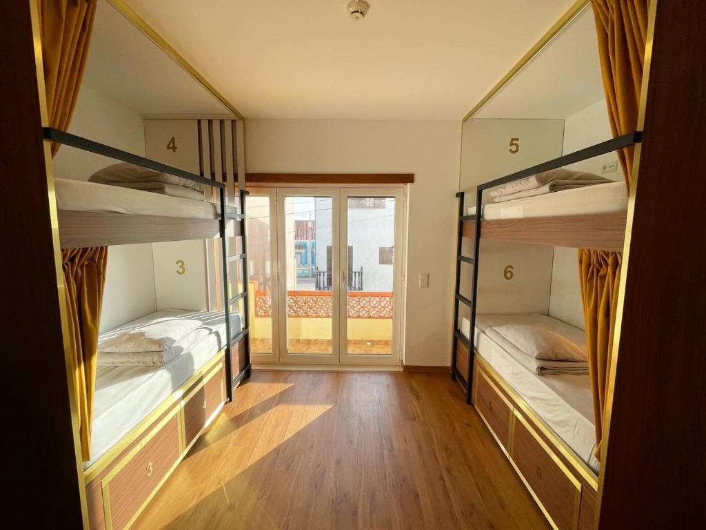 Postel nebo postele na pokoji v ubytování 33 Hostel