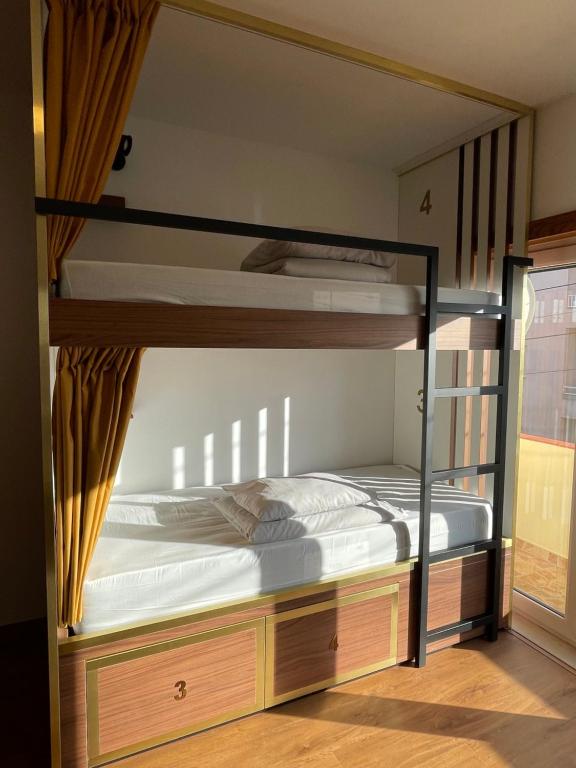 Postel nebo postele na pokoji v ubytování 33 Hostel