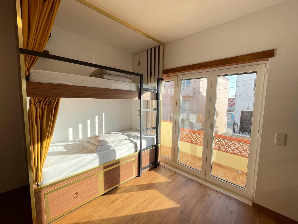 Postel nebo postele na pokoji v ubytování 33 Hostel