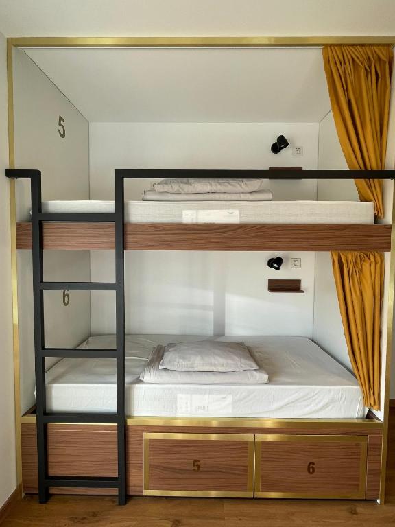 Postel nebo postele na pokoji v ubytování 33 Hostel