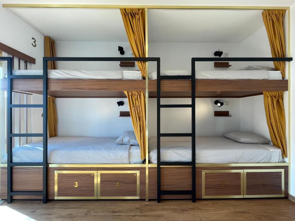 Postel nebo postele na pokoji v ubytování 33 Hostel