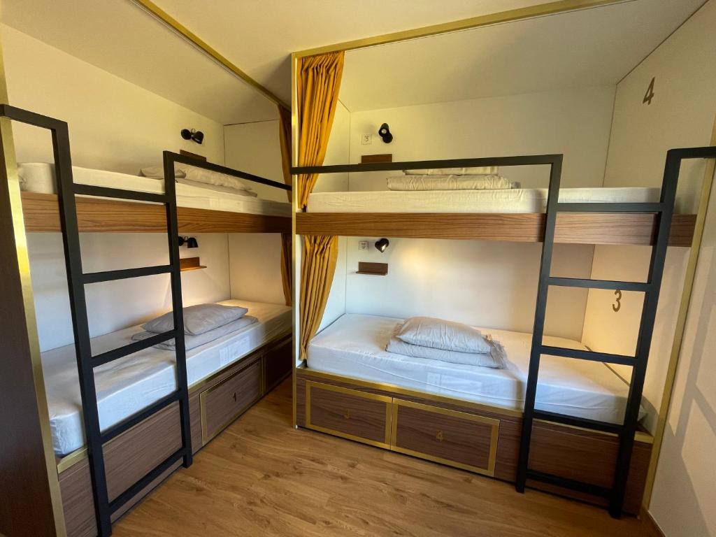 Postel nebo postele na pokoji v ubytování 33 Hostel